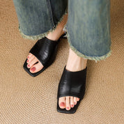 Virelle Curve Leather Mule Heels