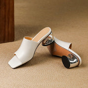 Virelle Curve Leather Mule Heels