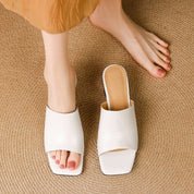 Virelle Curve Leather Mule Heels